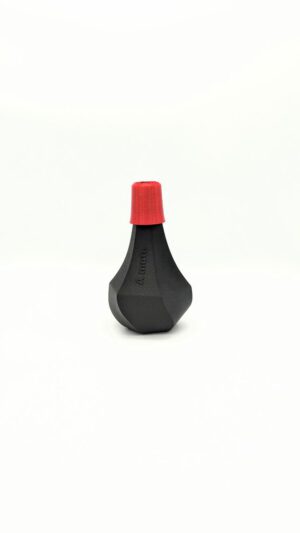 Silencieux A-Mute pour trompette piccolo - Vue de face de la sourdine compacte en matériau renforcé de fibres de carbone pour une pratique silencieuse et une intonation précise.